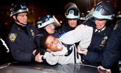 Police arrest a demonstrator during a march after a vigil held for Kimani Gray in Brooklyn, N.Y., on March 13.