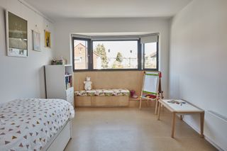Kid's room with built-in plywood furniture