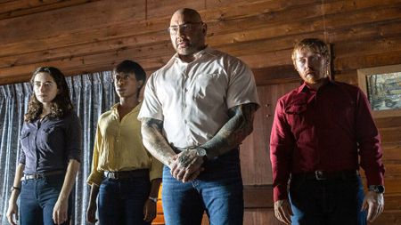 Abby Quinn, Nikki Amuka-Bird, Dave Bautista and Rupert Grint in "Knock at the Cabin" movie (2023)