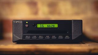 Cyrus CDi CD player with display turned on against a hazy background