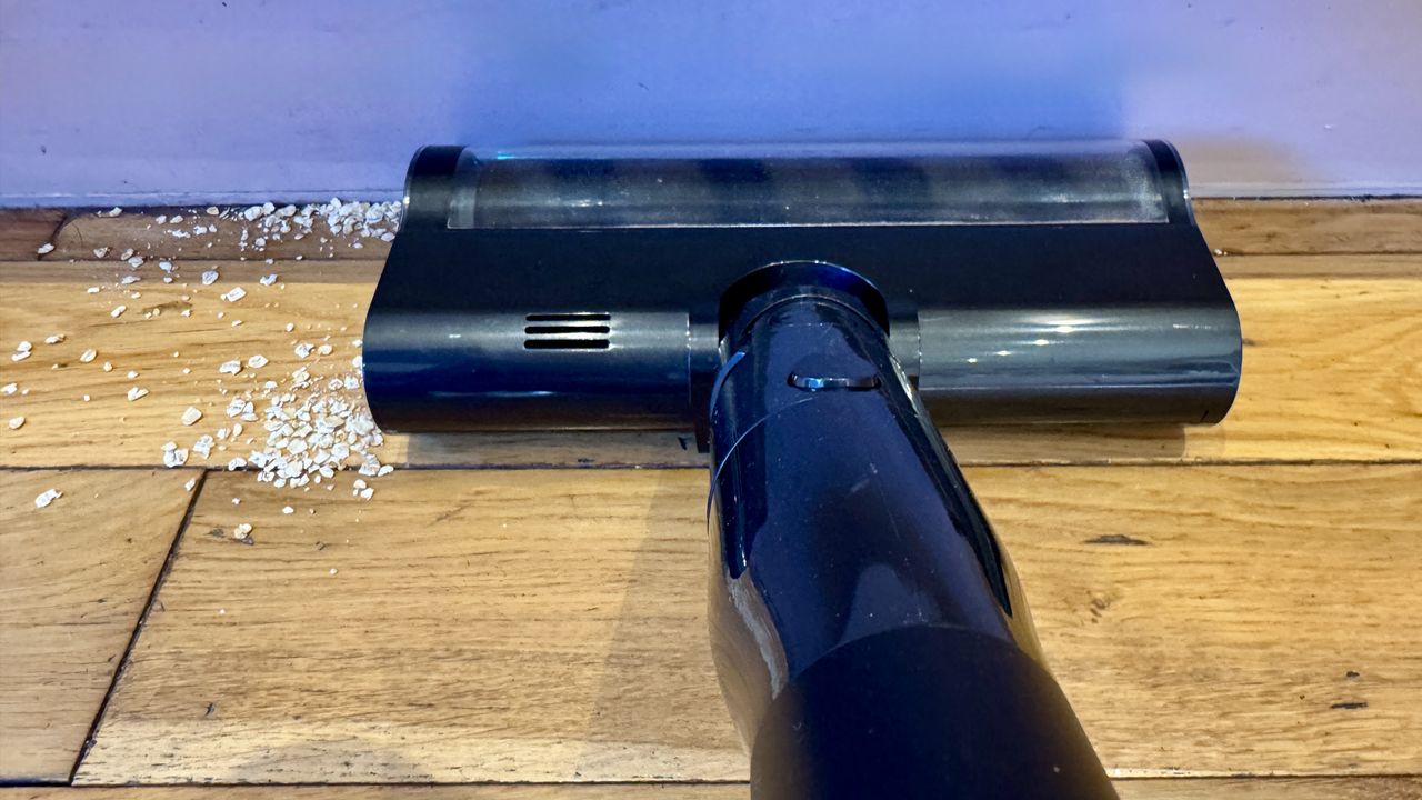 Dreame V20 Pro vacuum cleaning the edge of a room