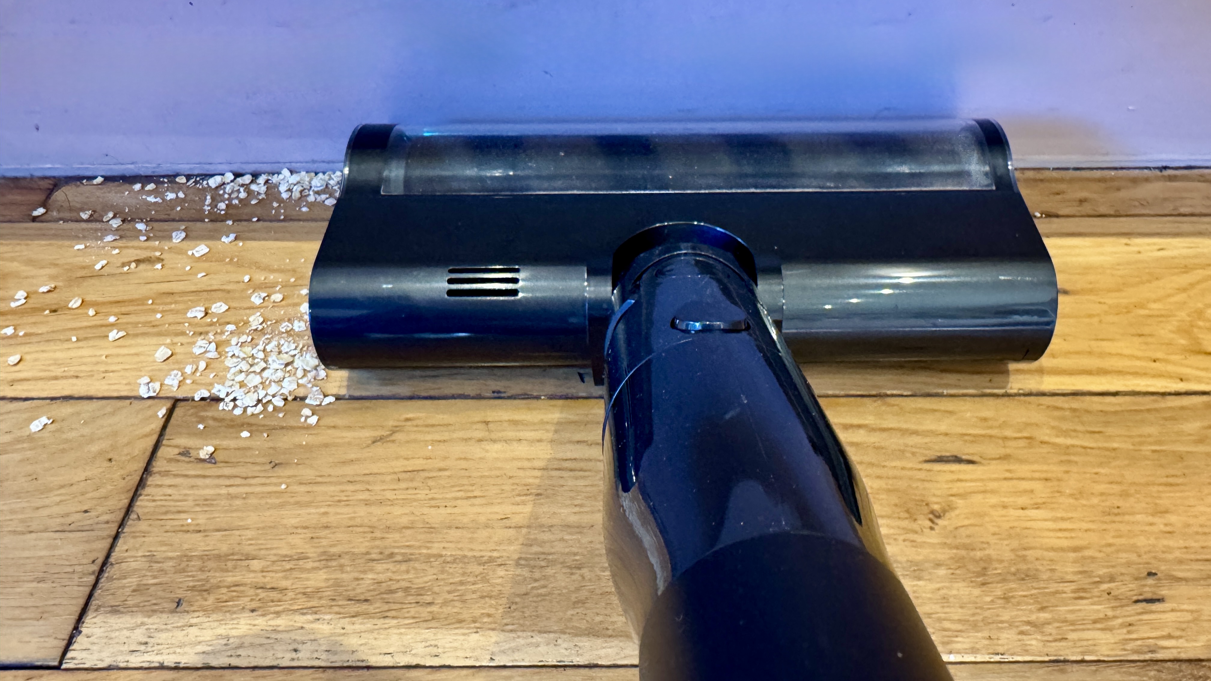 Dreame V20 Pro vacuum cleaning the edge of a room