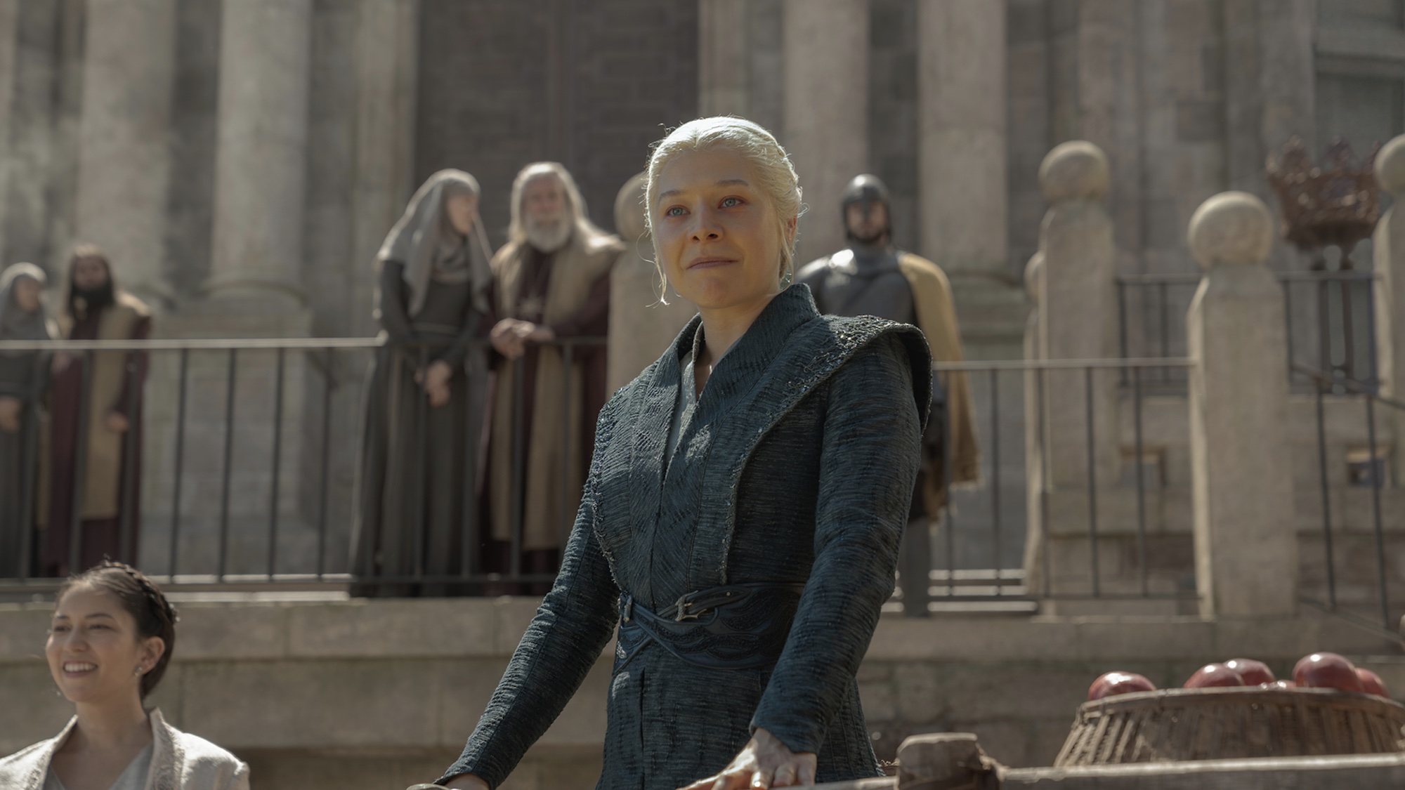 Rhaenyra smiling after giving the smallfolk food in House of the Dragon.  