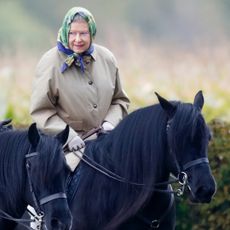 Queen Elizabeth II, accompanied by her Stud Groom Terry Pendry, seen horse riding in the grounds of Windsor Castle on October 18, 2008