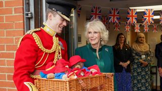 Camilla, Queen Consort attends a special teddy bears picnic at a Barnardo's Nursery in Bow on November 24, 2022 in London, England. During the visit The Queen Consort personally delivered Paddington bears and other cuddly toys that were left as tributes to Queen Elizabeth II to children supported by the charity. In 2016, Her Majesty Queen Elizabeth II passed the patronage of Barnardo's to the then Duchess of Cornwall.