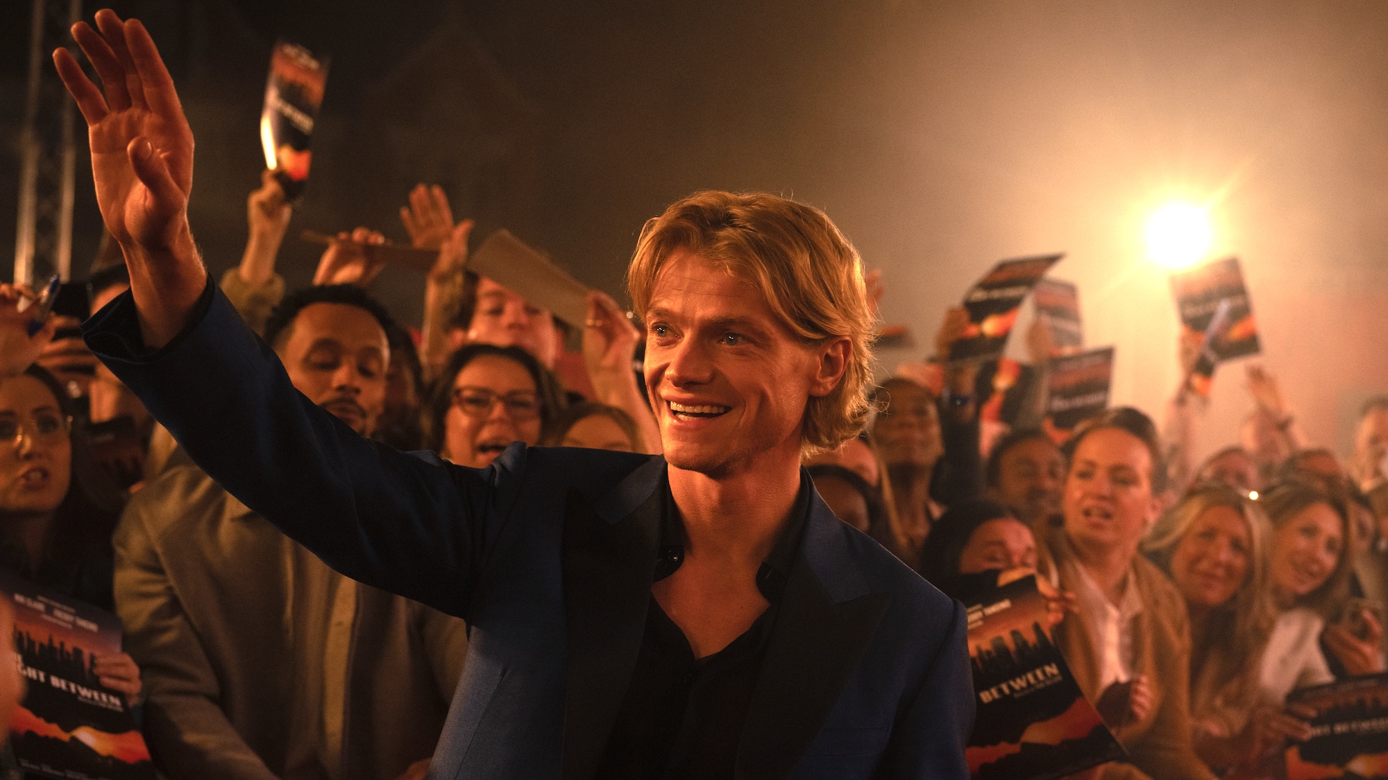 TOM RHYS HARRIES as Matt Hagen waving to a crowd of fans in DC Studios&rsquo; &ldquo;Clayface,&rdquo; a Warner Bros. Pictures Release.