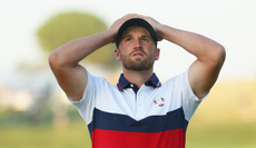 Wyndham Clark puts his hand on his head after a missed putt at the Ryder Cup