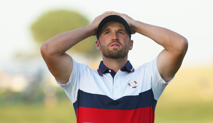 Wyndham Clark puts his hand on his head after a missed putt at the Ryder Cup