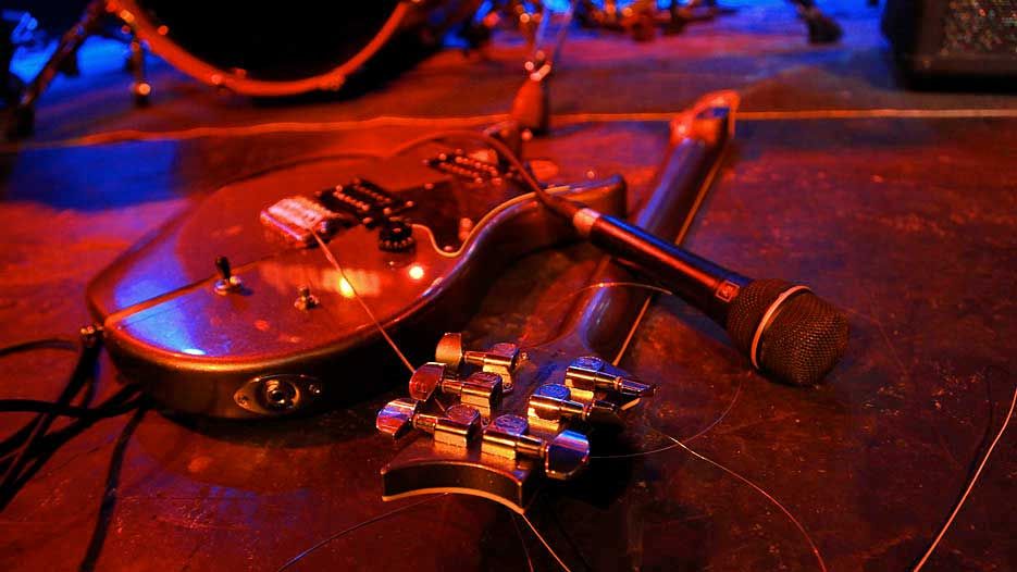 A smashed guitar onstage