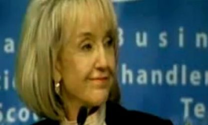 Gov. Jan Brewer (R-Ariz.) tries to salvage an awkward moment with a laugh after her TelePrompTer dies mid-speech.