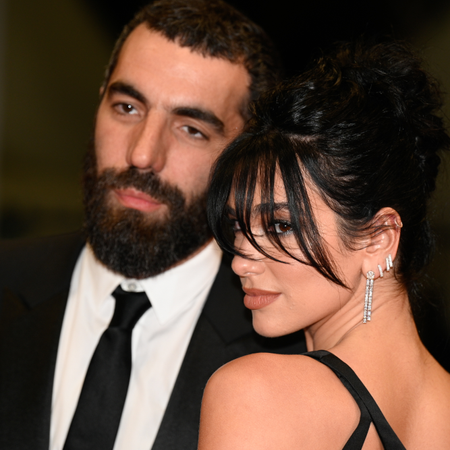 Dua Lipa and Romain Gavras attend the "Omar La Fraise (The King of Algiers)" red carpet during the 76th annual Cannes film festival at Palais des Festivals on May 19, 2023 in Cannes, France.