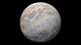 Jupiter looks like a big, swirly space marble in this composite image from NASA's Juno spacecraft. Citizen scientist Kevin Gill processed this image using data collected by Juno during its 23rd close flyby of Jupiter, called a perijove, on Sunday (Nov. 3).