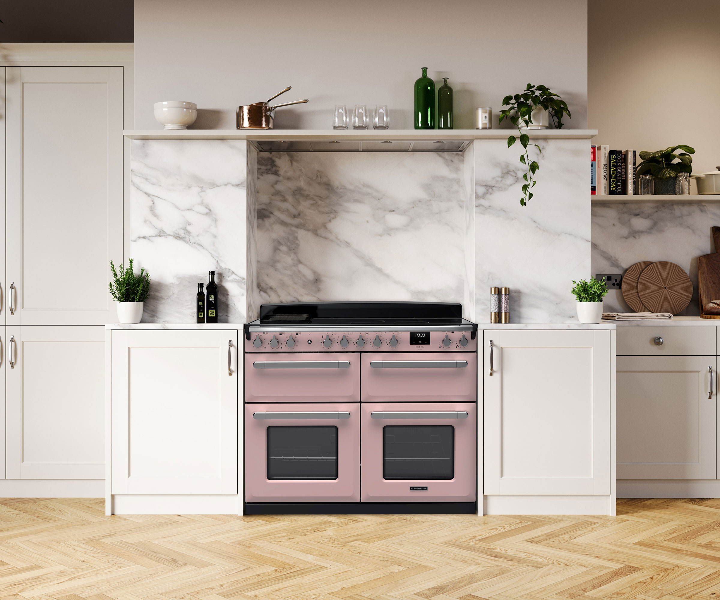 pink Rangemaster range cooker with induction hob in white kitchen
