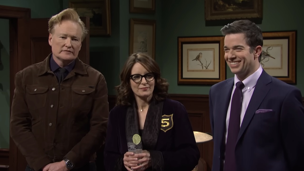 Conan O'Brien, Tina Fey and a smiling John Mulaney in Saturday Night Live Five-Timers Club sketch 2024