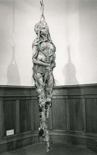 Morbid Curiosity: Richard Harris Collection: This suspended figure shows parts of the body reassembled and held together with sea grass. It mimics decomposition and reminds us of our physical existence. The figure is made from a human skeleton, and preser