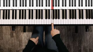 Overhead shot of hands on a keyboard