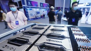 Visitors stop by an AI server based on NVIDIA A100 chips at the 2021 Global Artificial Intelligence Technology Conference (GAITC2021) in Hangzhou in east China