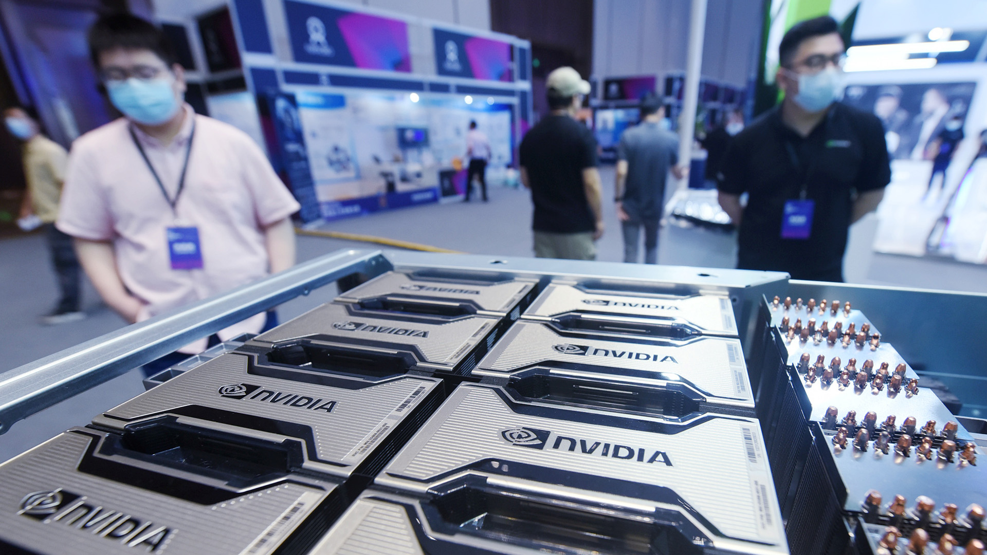 Visitors stop by an AI server based on NVIDIA A100 chips at the 2021 Global Artificial Intelligence Technology Conference (GAITC2021) in Hangzhou in east China