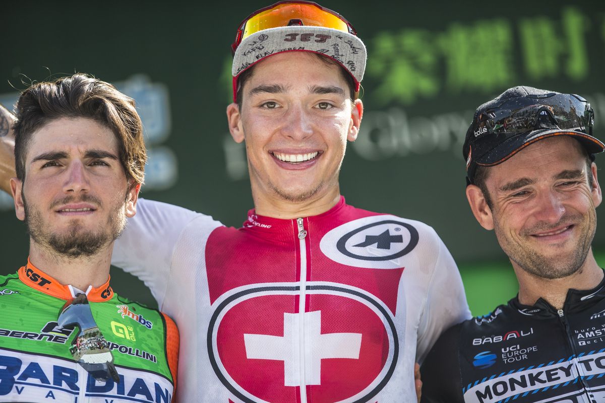 Simon Pellaud on the podium