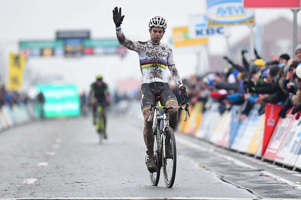Wout Van Aert celebrates the overall Superprestige win