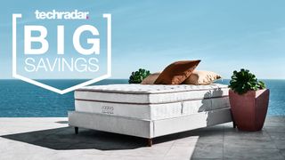 Saatva sales and deals: Saatva Classic mattress in a sunny landscape, with savings flag overlaid