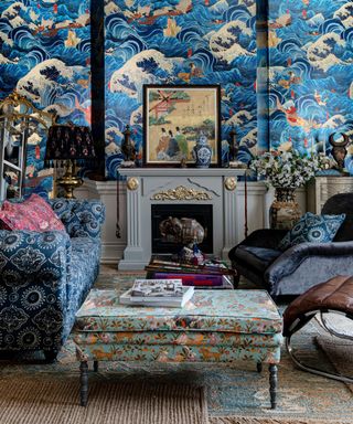 Blue living room decorated with maximalist wallpaper