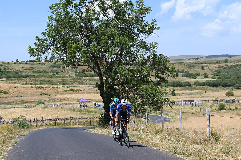 LE LIORAN, FRANCE - JULY 14: (L-R) Harold Tejada of Colombia and Team XDS Astana and Javier Romo of Spain and Team Movistar compete in the breakaway competes during the 113th Tour de France 2026, Stage 10 a 166.6km stage from Aurillac to Le Lioran 1240m / #UCIWT / on July 14, 2026 in Le Lioran, France. (Photo by Dario Belingheri/Getty Images)
