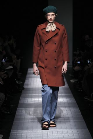 Man on Gucci runway in beret and coat
