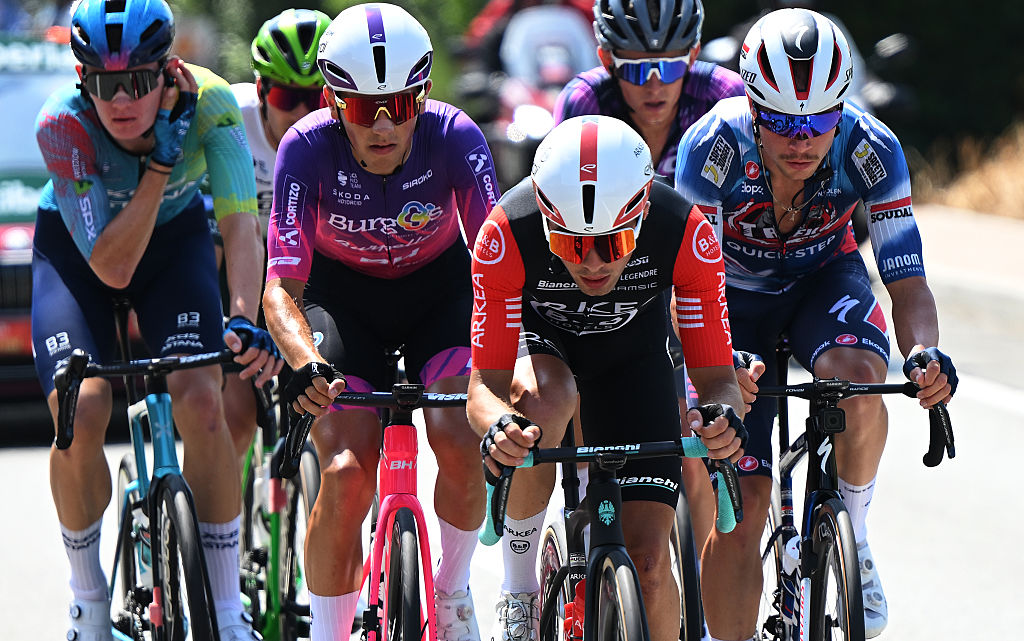 NOVARA, ITALY - AUGUST 23: (L-R) Hugo De La Calle of Spain and Team Burgos Burpellet BH, Alessandro Verre of Italy and Team Arkea - B&B Hotels and Pepijn Reinderink of Netherlands and Team Soudal Quick-Step compete in the breakaway during the La Vuelta - 80th Tour of Spain 2025, Stage 1 a 186.7km stage from Torino-Reggia di Venaria to Novara / #UCIWT / on August 23, 2025 in Novara, Italy. (Photo by Dario Belingheri/Getty Images)