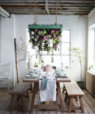 Casual dining area with bench in conservatory by Neptune