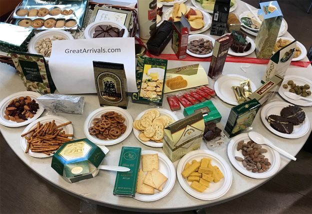 We spread the GreatArrivals.com basket out on a table in our break room for the taste test.