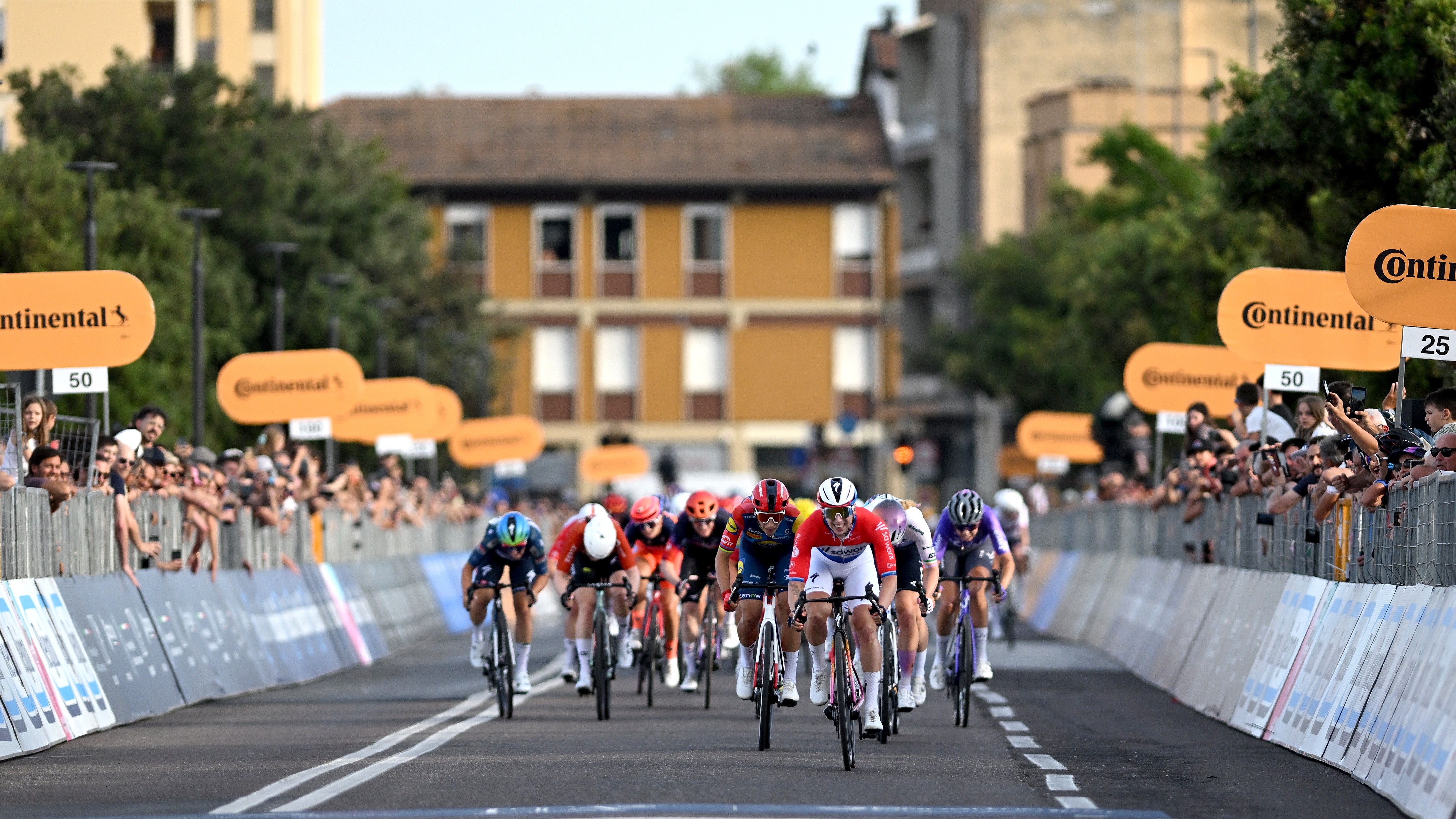 Lorena Wiebes of Team SD Worx - Protime, Elisa Balsamo of Italy and Team Lidl - Trek, Lara Gillespie of Ireland and UAE Team ADQ sprint at finish line during the 37th Giro d'Italia Women 2026