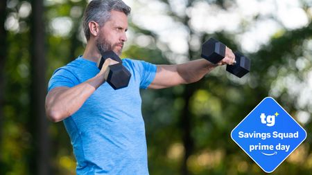 Male in blue t-shirt holding dumbbells outdoors during workout; bottom right, TG savings badge