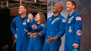 four people in blue flight suits stand on a stage in an amphitheater surrounded by red stone cliffs