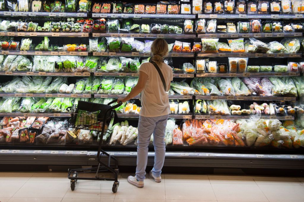 A person grocery shops.