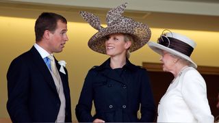 Queen Elizabeth II, Zara Tindall and Mark Phillips chat together on the royal balcony during Ladies Day on day three of Royal Ascot on June 21, 2007