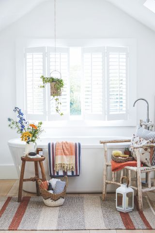 white bathroom with colorful accessories