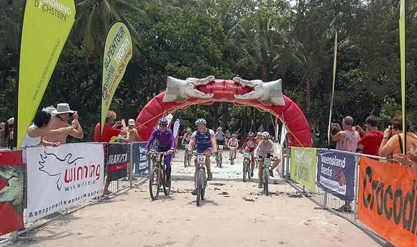 Chris Neal crosses the finish line in first place on the final day.