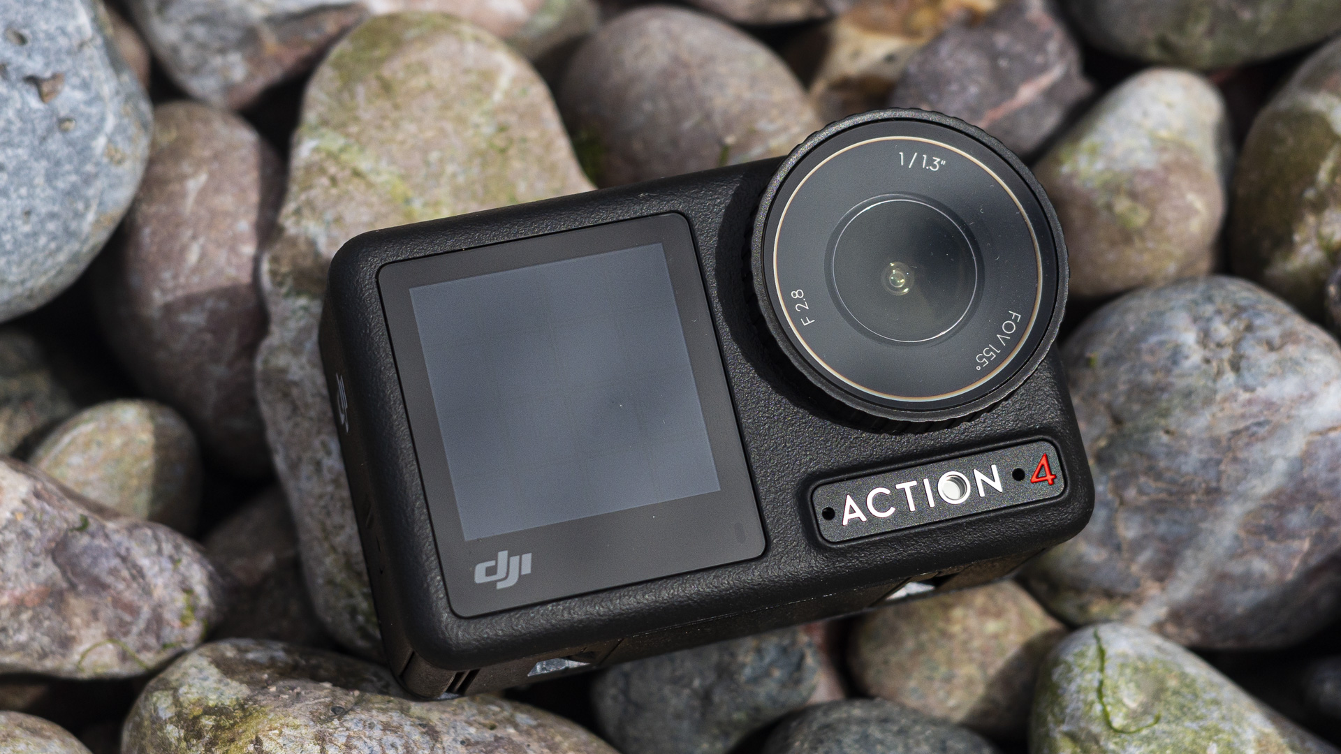 DJI Osmo Action 4 camera on a stony beach