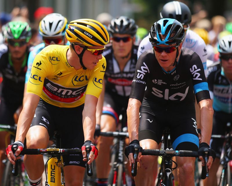 Rohan Dennis and Chris Froome chat as the peloton rolls out for stage 2