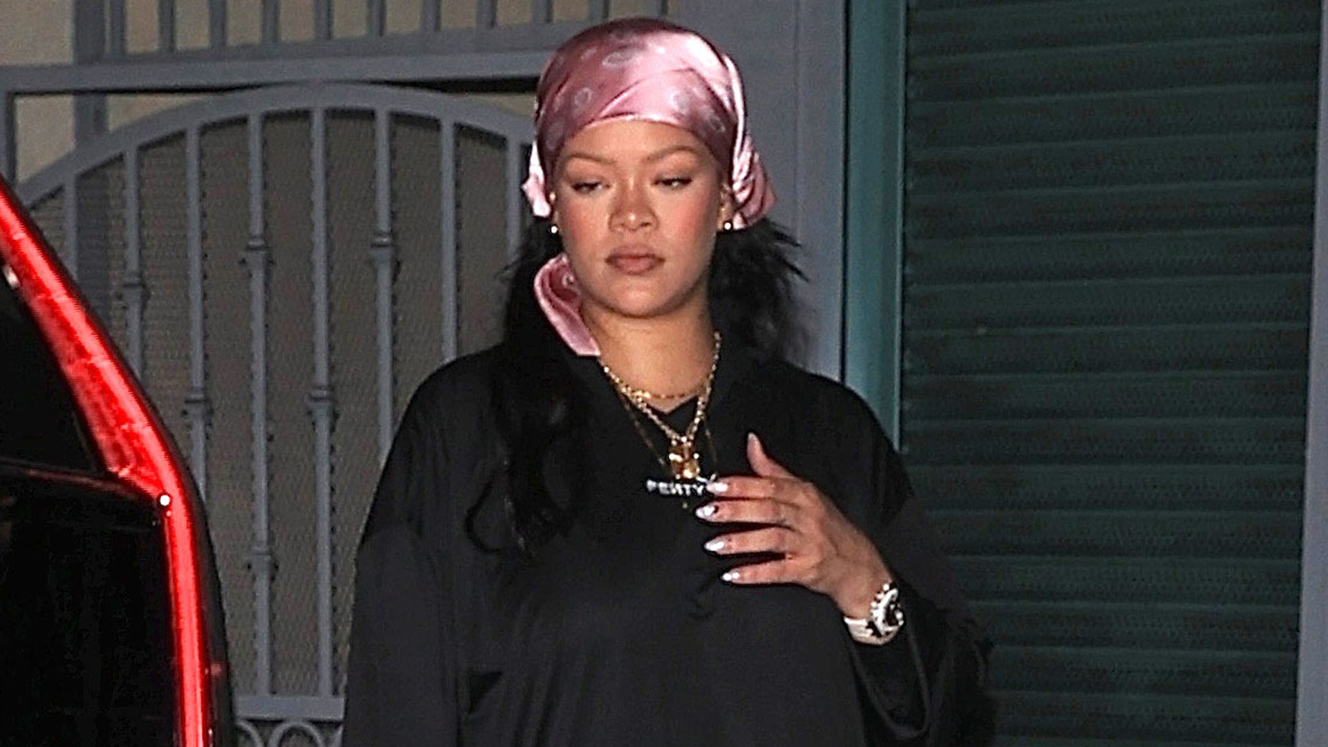 Rihanna wore satin pink sneakerinas from Prada for her first outing post-giving birth to a baby girl