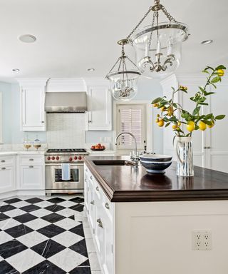 Gwyneth Paltrow's kitchen with chequered flooring and a lemon tree