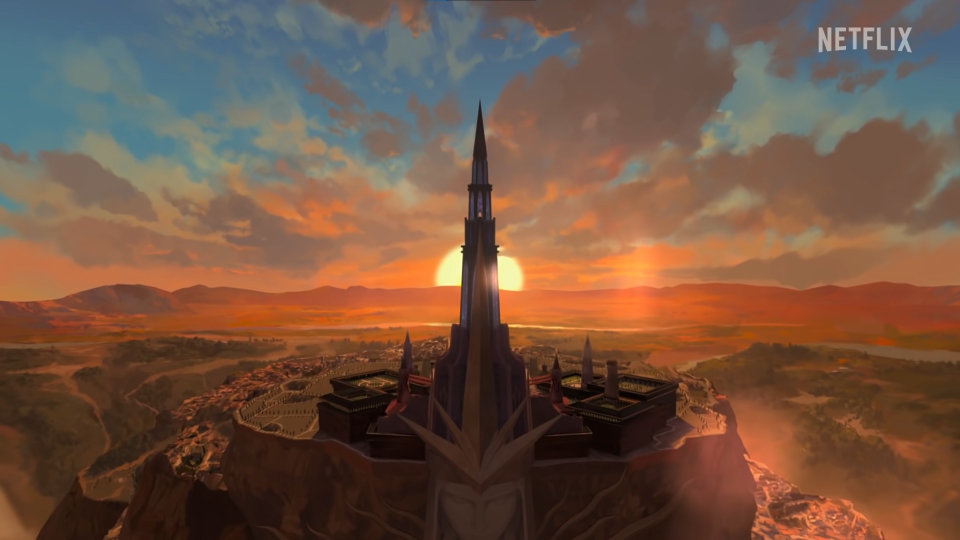 Dragon Age: Absolution teaser trailer - A sunset behind the spire of a tower overlooking a city on a mesa.