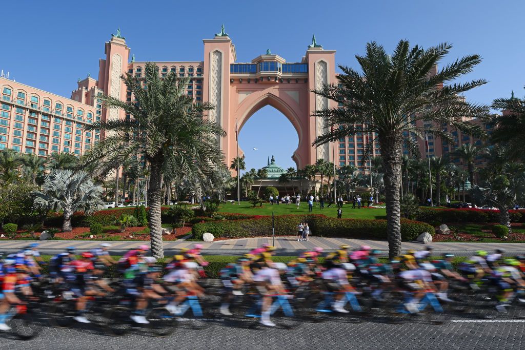 DUBAI HARBOUR UNITED ARAB EMIRATES FEBRUARY 23 A general view of the peloton passing in front of the Atlantis The Palm hotel during the 5th UAE Tour Stage 4 a 174km stage from Al Shindagha to Dubai Harbour UAETour UCIWT on February 23 2023 in Dubai Harbour United Arab Emirates Photo by Dario BelingheriGetty Images