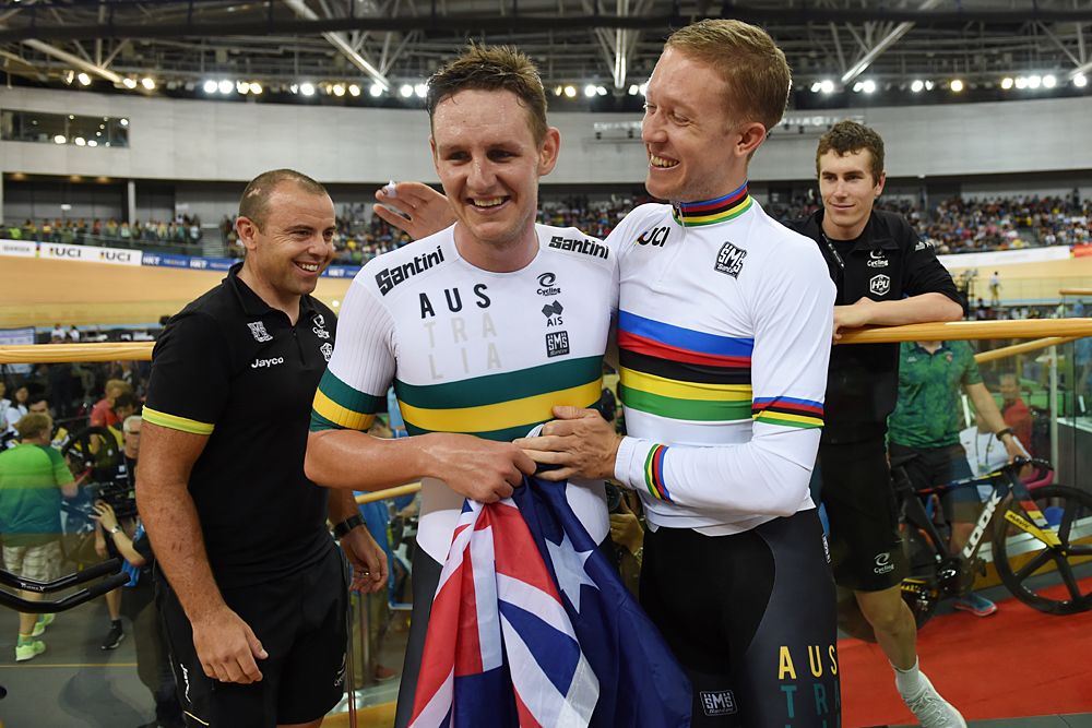 Jordan Kerby is congratulated by fellow world champion Cameron Meyer