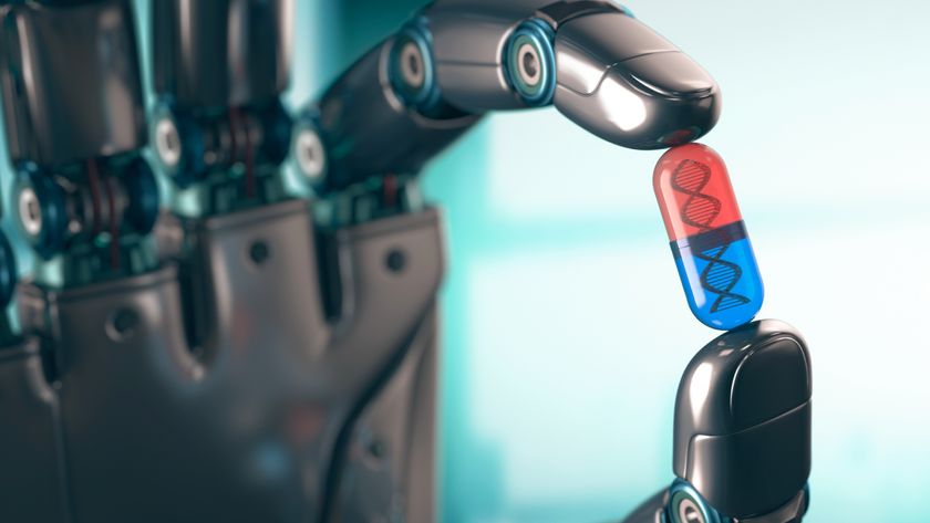 Robotic hand holding a capsule with a DNA (deoxyribonucleic acid) double helix inside, computer illustration.