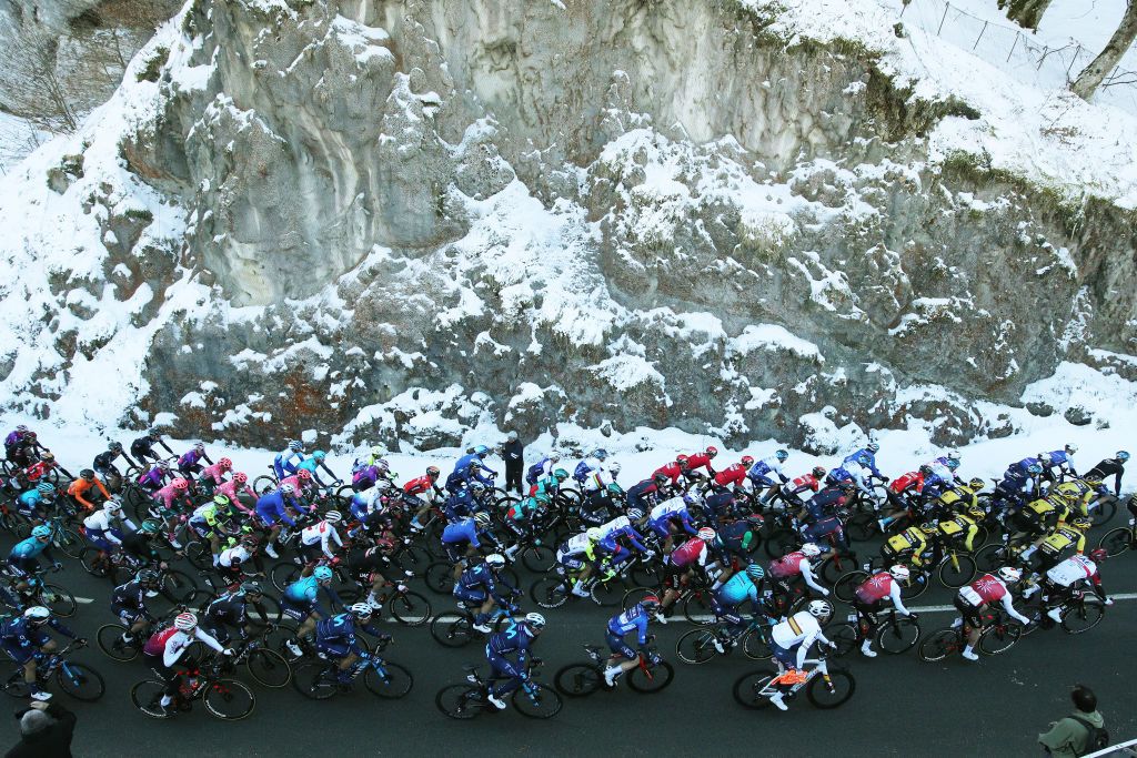 VIANA SPAIN APRIL 05 A general view of the Peloton passing through a snowy landscape during the 61st Itzulia Basque Country 2022 Stage 2 a 2076km stage from Leitza to Viana 461m itzulia WorldTour on April 05 2022 in Viana Spain Photo by Gonzalo Arroyo MorenoGetty Images