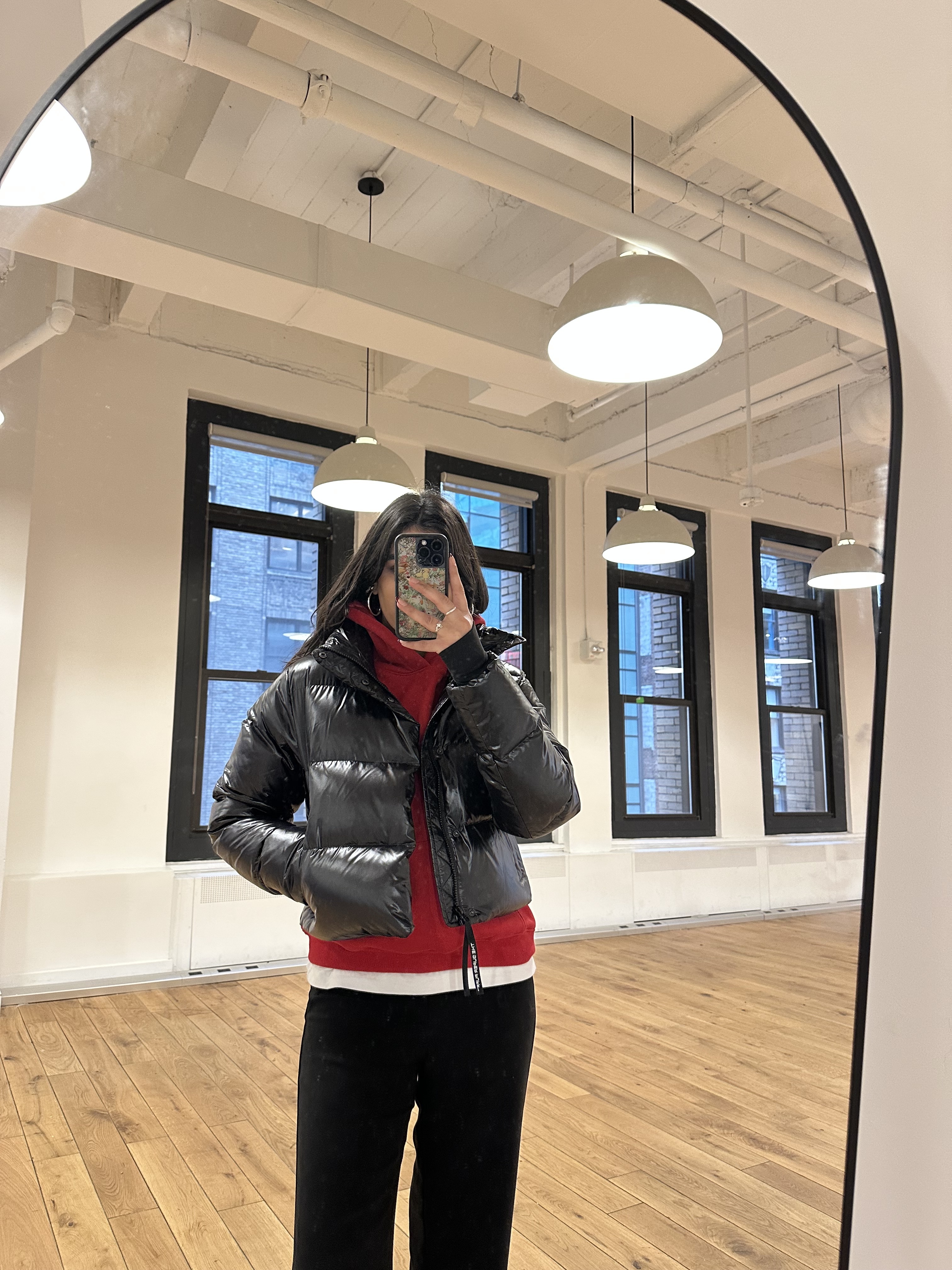 Who What Wear editors reviewing the Aritzia Super Puff.