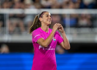 Alex Morgan #13 of San Diego Wave FC interacts with Washington Spirit fans during a game between San Diego Wave FC and Washington Spirit at Audi Field on June 15, 2024 in Washington, DC.