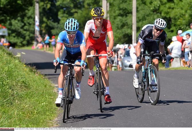 Tom Jelte Slagter (Garmin-Sharp) on the attack with Cyril Lemoine (Cofidis) and Jan Bakelants behind
